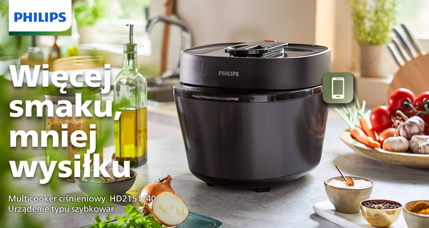 Na obrazie znajduje się multicooker marki PHILIPS z napisem \'Więcej smaku, mniej wysiłku\'. W tle widoczne są składniki kuchenne, takie jak oliwa, cebula i pomidory.