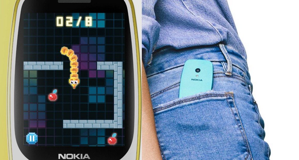 Po lewej stronie ekranu telefonu widać grę z wężem i wynikiem 02/8, poniżej logo NOKIA. Po prawej stronie telefon w kolorze niebieskim wystaje z kieszeni dżinsów.
