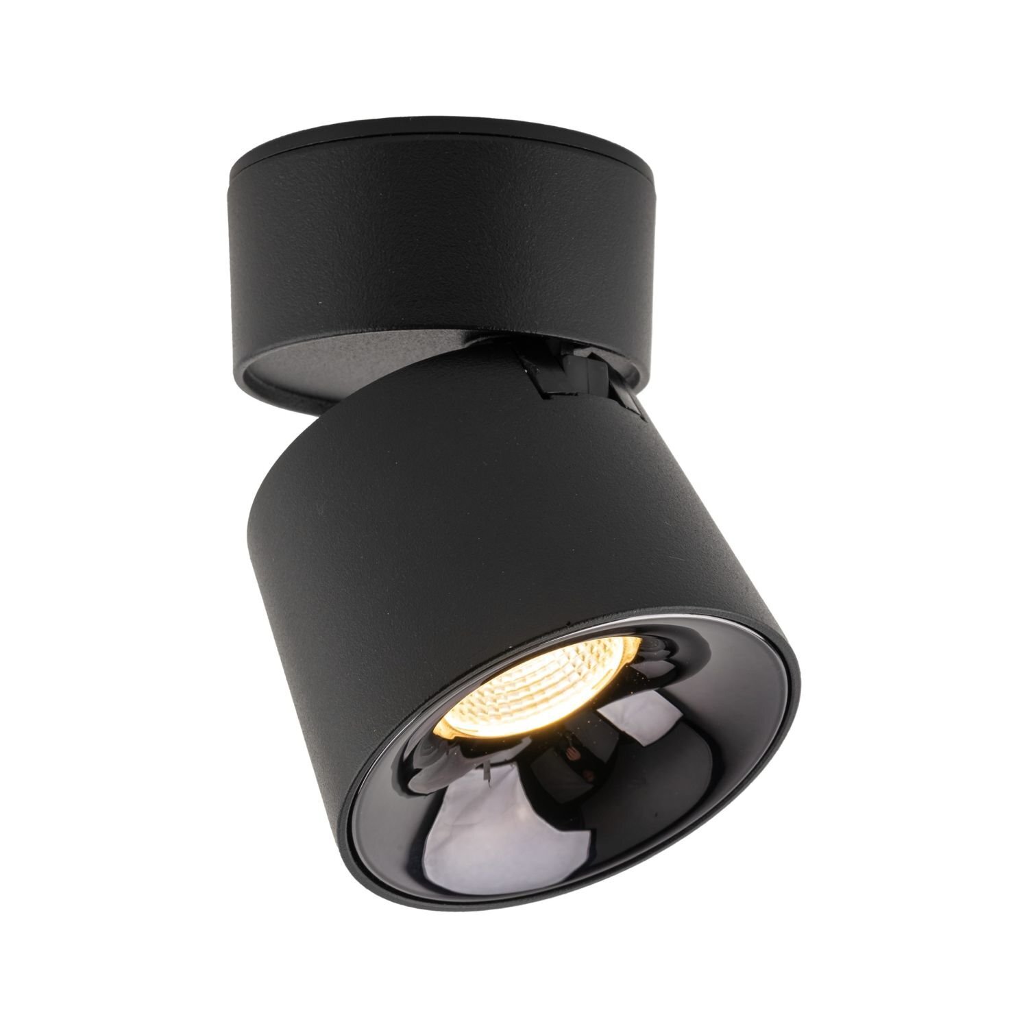 Czarna lampa reflektor LED z ruchomą głowicą, emitująca ciepłe białe światło. Lampa ma nowoczesny design i jest przeznaczona do montażu na suficie.