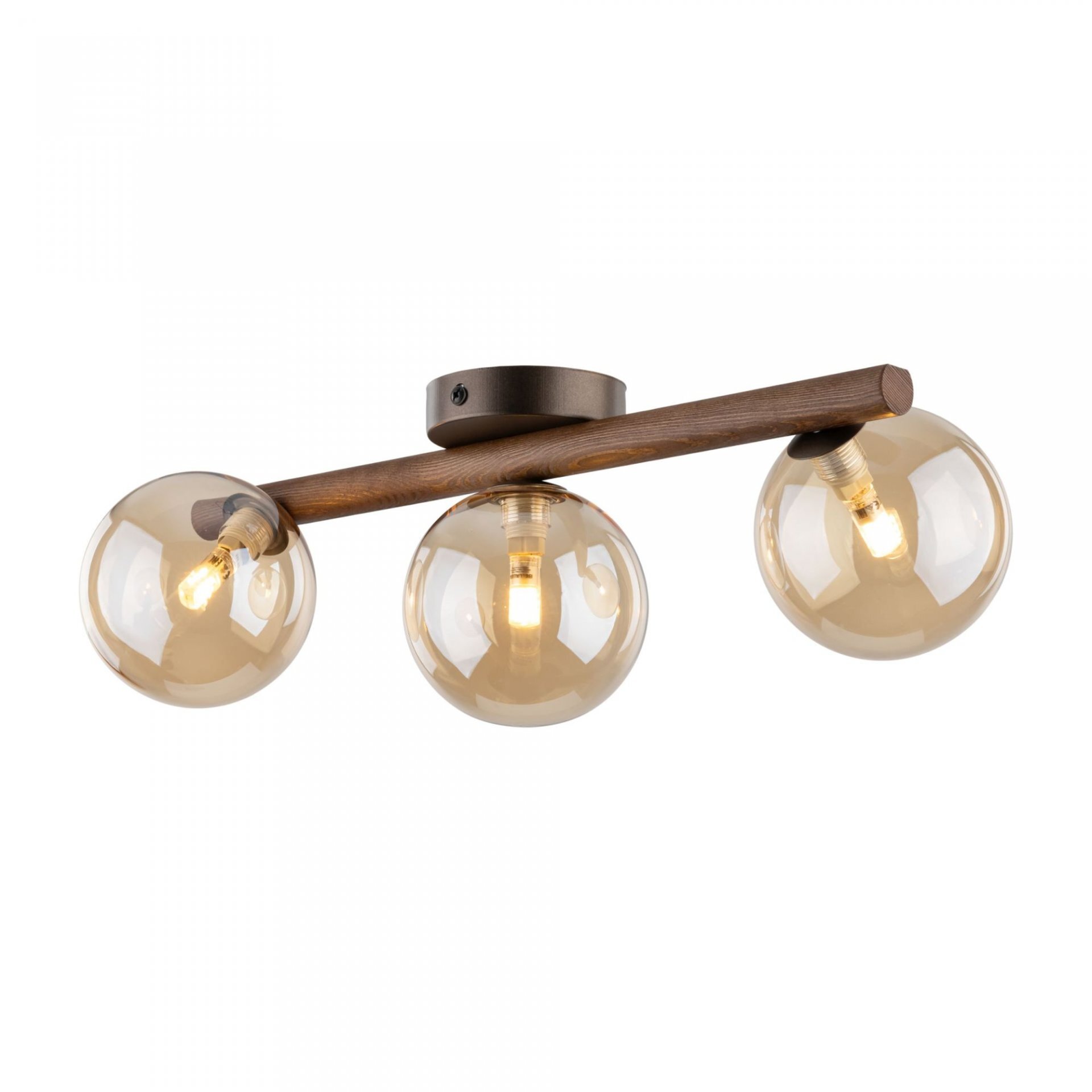 Lampa sufitowa z trzema bursztynowymi kloszami zamontowanymi na drewnianej belce. Klosze mają kulisty kształt, a całość jest utrzymana w brązowej kolorystyce.