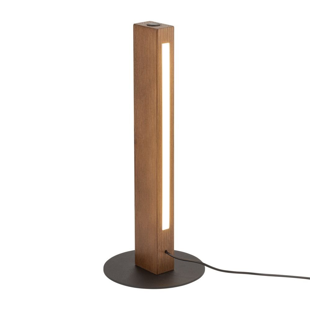 Lampa stołowa o prostokątnym, drewnianym korpusie z wbudowanym pionowym paskiem świetlnym, umieszczona na okrągłej, czarnej podstawie. Z lampy wychodzi czarny przewód zasilający.