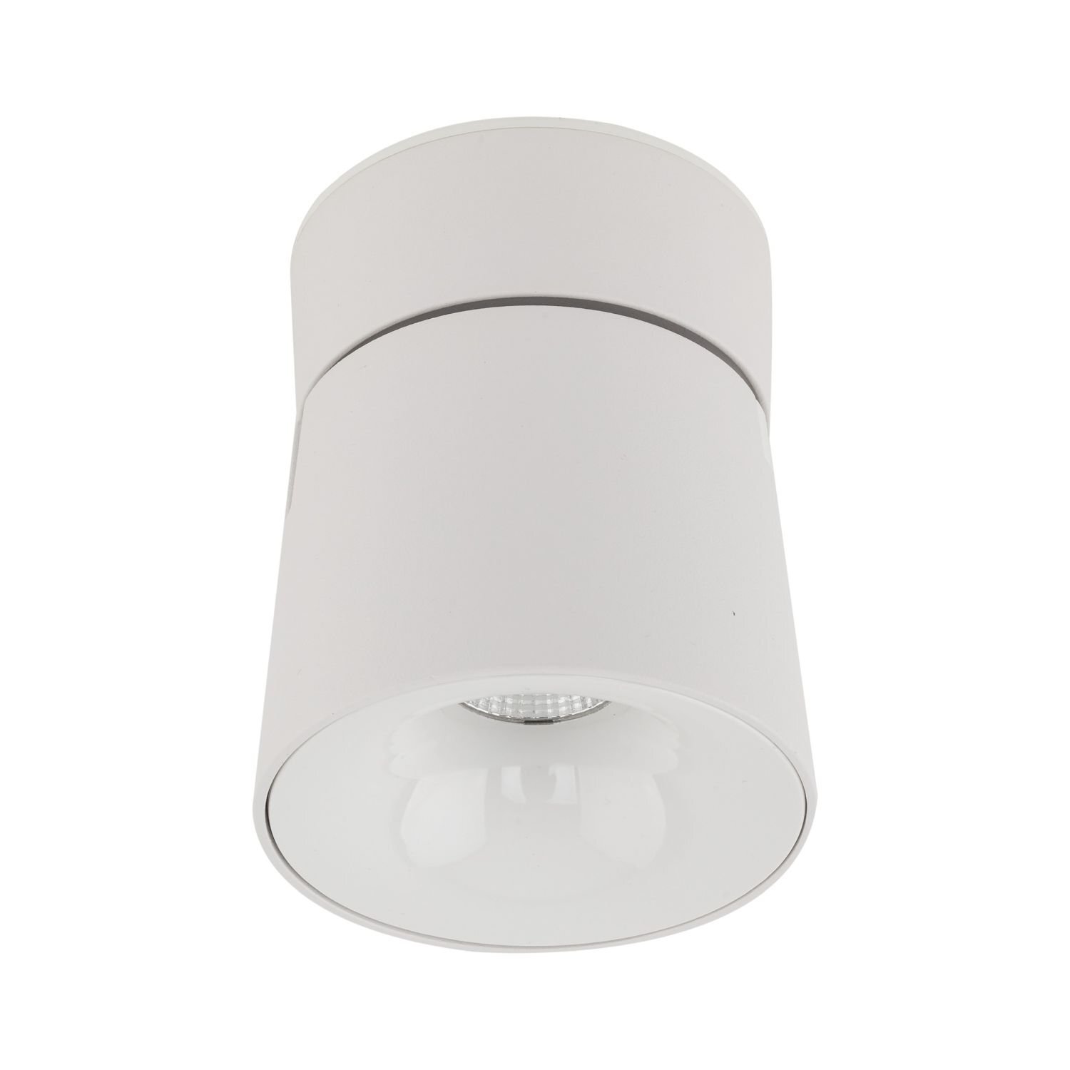 Biała, cylindryczna lampa reflektorowa LED z minimalistycznym designem, skierowana w dół. Widoczna jest gładka powierzchnia i centralnie umieszczone źródło światła.