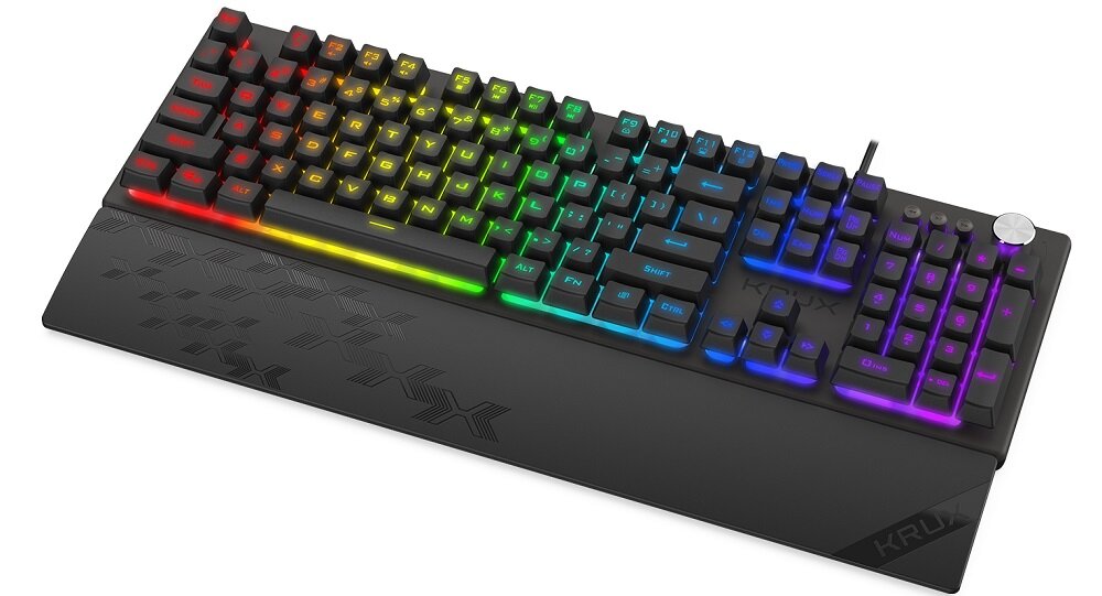Klawiatura mechaniczna z podświetleniem RGB, posiadająca klawisze w różnych kolorach. Na podpórce widoczne jest logo \'KRUX\'.