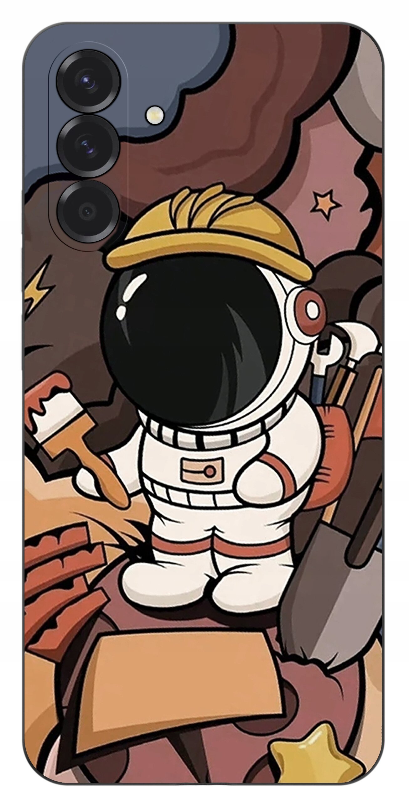 Etui z kolorowym wzorem przedstawiającym postać astronauty w kasku budowlanym, trzymającego pędzel i otoczonego narzędziami. Tło jest w odcieniach brązu i beżu z elementami gwiazd i chmur.