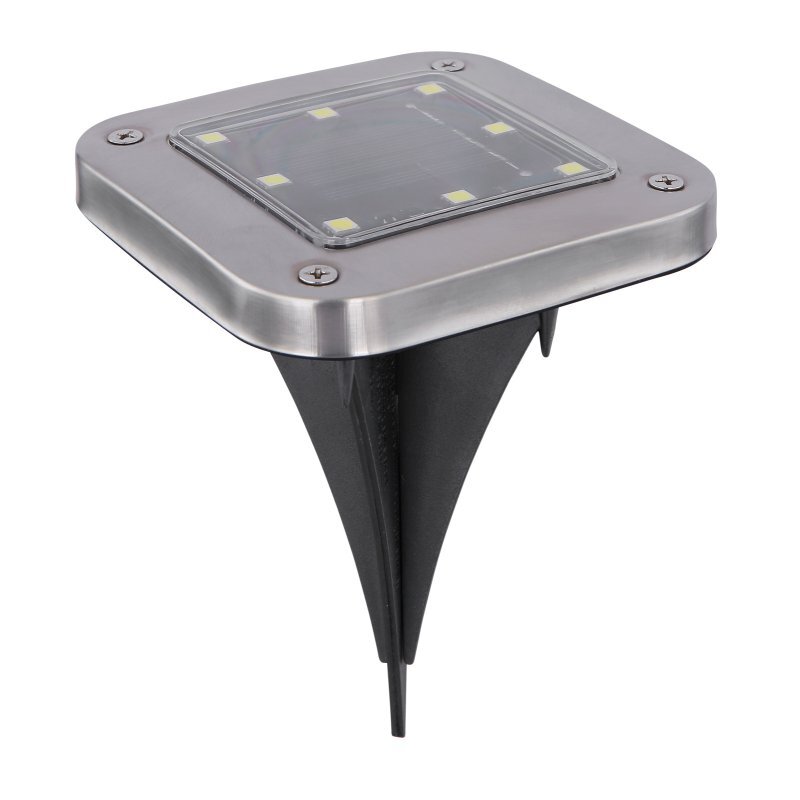 Lampa solarna z metalową obudową i przezroczystym panelem na górze, wyposażona w kilka widocznych diod LED. Posiada czarny, plastikowy szpikulec do montażu w ziemi.
