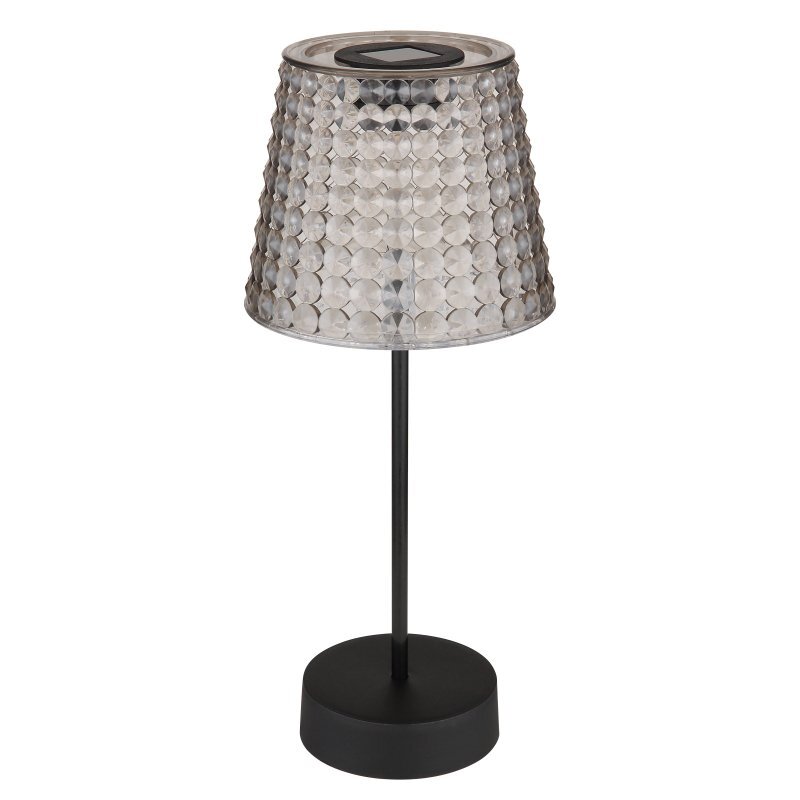 Lampa stołowa z czarną podstawą i trzonkiem, posiada klosz o fakturze przypominającej kryształki. Na górze klosza widoczny jest panel solarny.