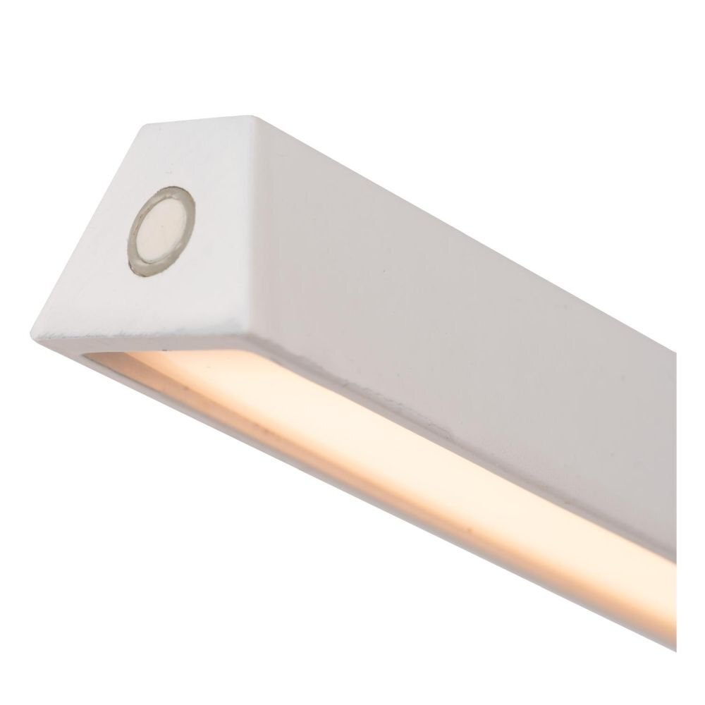 Biała, prostokątna lampa LED z wbudowanym przyciskiem na jednym z końców. Emituje ciepłe, rozproszone światło.