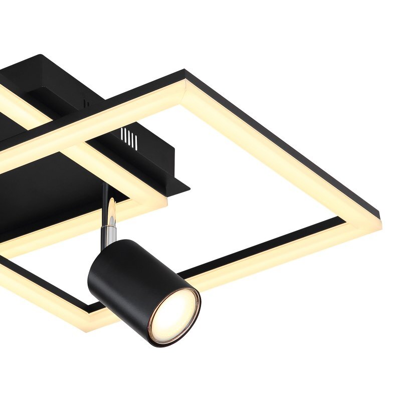 Lampa sufitowa LED o nowoczesnym designie, z czarną matową ramą i wbudowanym reflektorem. Światło emitowane jest przez prostokątną ramę oraz dodatkowy punkt świetlny.