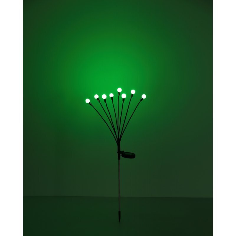 Lampa solarna ogrodowa z ośmioma świecącymi kulkami LED, emitująca zielone światło. Lampa jest zamocowana na cienkim metalowym pręcie.