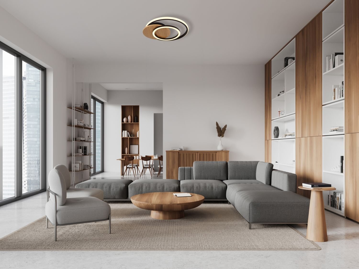 Nowoczesny salon z szarą sofą, drewnianym stolikiem kawowym i regałami na książki. Na suficie zamontowana jest lampa LED o nowoczesnym designie.