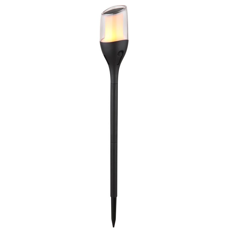 Czarna lampa solarna LED z przezroczystym kloszem, emitująca ciepłe światło, zamontowana na długim, smukłym trzonku zakończonym szpikulcem do wbicia w ziemię.