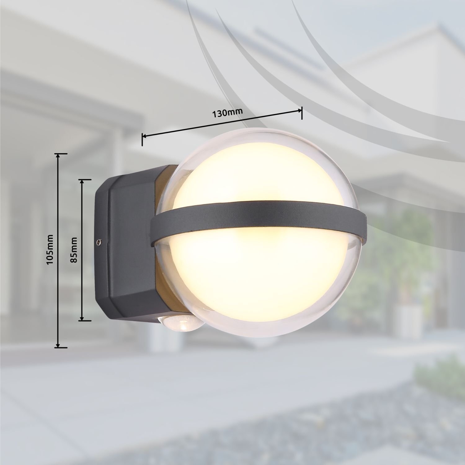 Na obrazie widoczna jest lampa ścienna o kulistym kształcie z czarnym uchwytem, emitująca ciepłe światło. Obok lampy znajdują się wymiary: 130mm, 105mm i 85mm.