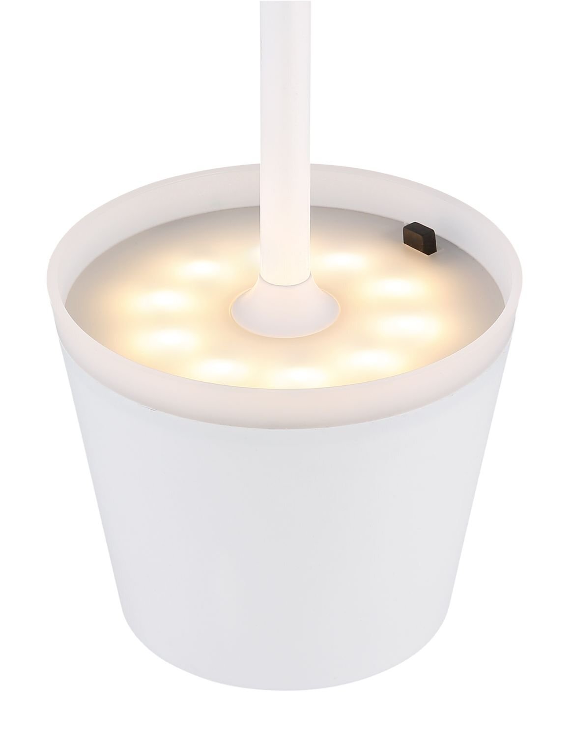 Biała lampa stołowa zewnętrzna LED z okrągłym kloszem, emitująca ciepłe światło. Na krawędzi klosza znajduje się mały, ciemny przycisk.