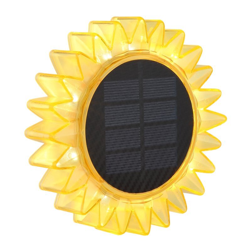 Lampa solarna w kształcie słonecznika z żółtymi płatkami i panelem słonecznym w centrum.