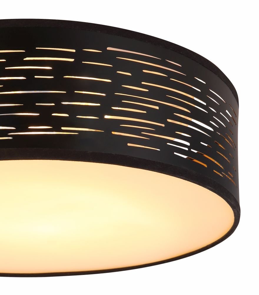 Lampa sufitowa LED z czarno-złotym kloszem, który ma nieregularne, poziome wycięcia przepuszczające światło. Dolna część lampy emituje jednolite, ciepłe światło.