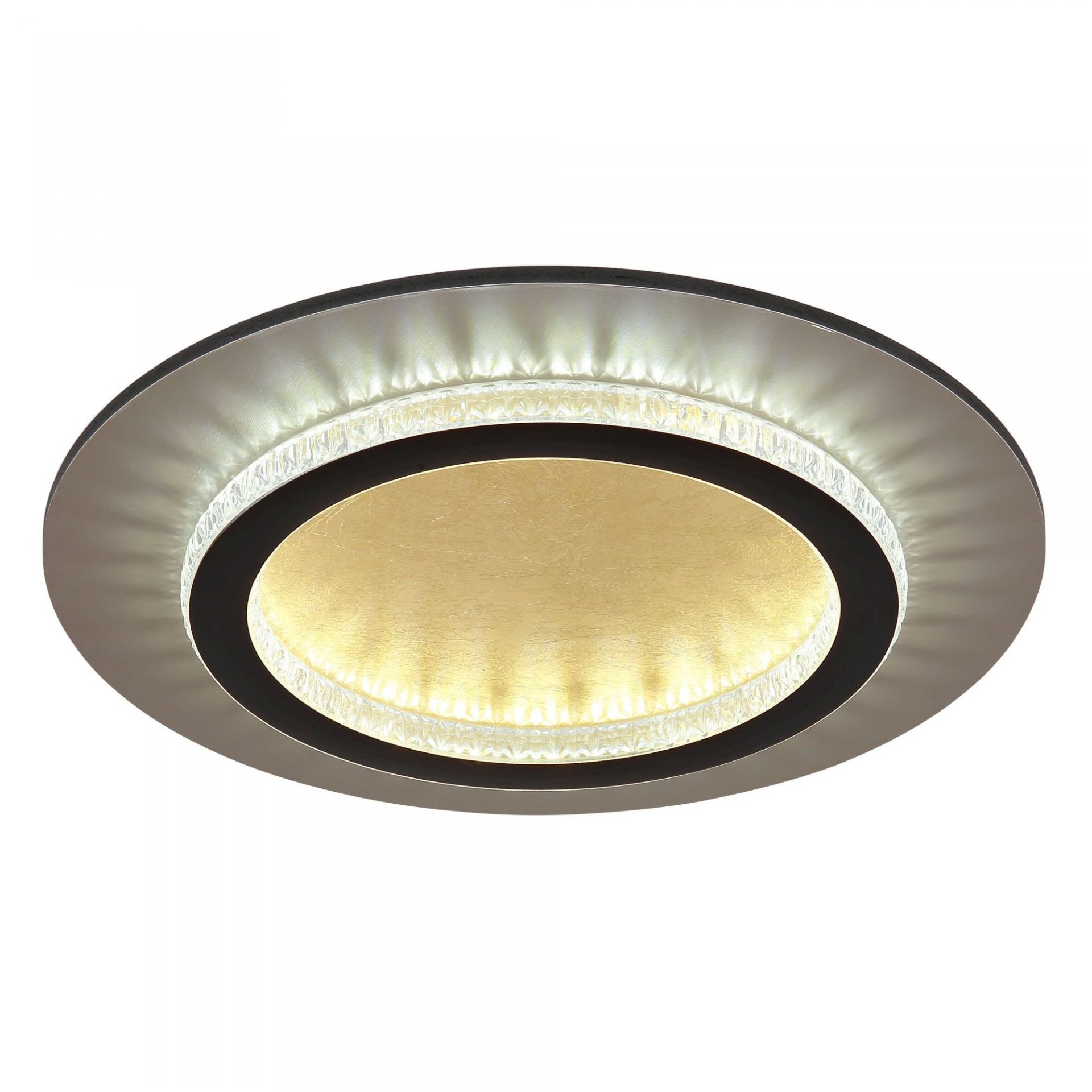 Obraz przedstawia nowoczesny plafon sufitowy LED o okrągłym kształcie z centralnym złotym elementem otoczonym jasnym światłem. Lampa ma elegancki, minimalistyczny design z ciemnym pierścieniem oddzielającym centralną część od zewnętrznej obwódki.