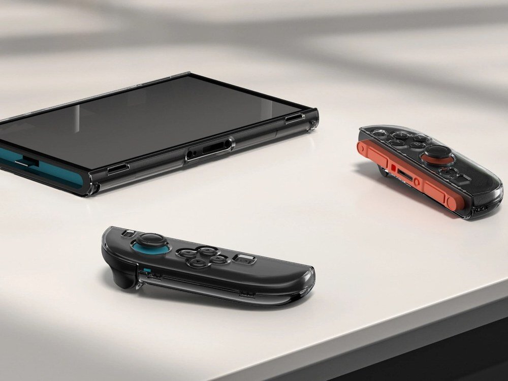 Przezroczyste etui AmazingThing PlayShield Bare Case z Nintendo Switch 2 rozłożone na białym blacie — widoczne dwa Joy-Cony i tafla ekranu.