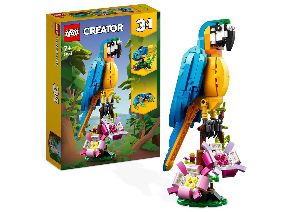 Zestaw LEGO Creator 3w1 z egzotyczną papugą w kolorach niebieskim, żółtym i pomarańczowym, stojącą na gałęzi z kwiatami. Opakowanie pokazuje trzy różne modele do zbudowania z tego zestawu.