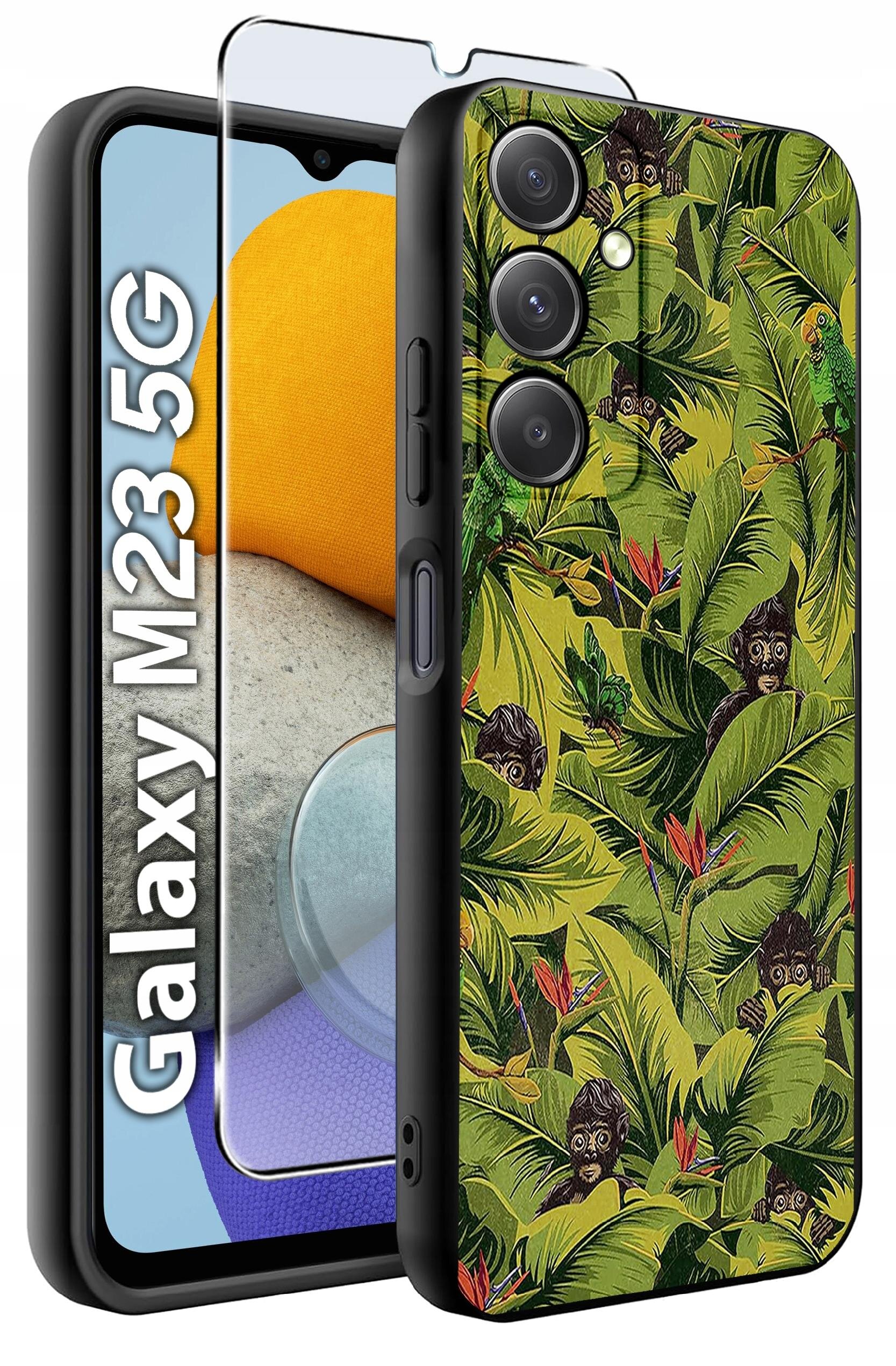 Etui na telefon z motywem tropikalnych liści i małp, obok którego znajduje się szkło ochronne. Na ekranie telefonu widoczny jest napis \'Galaxy M23 5G\'.