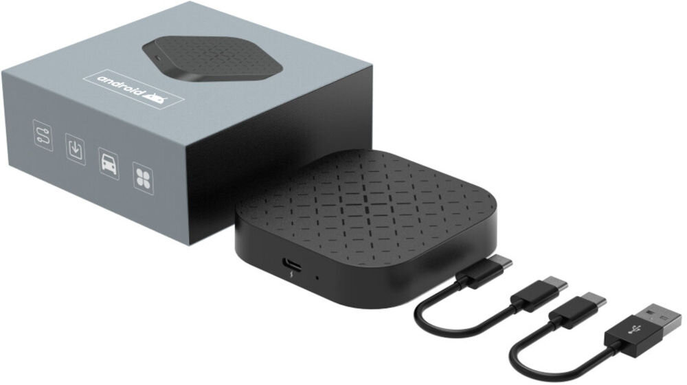 Na obrazie znajduje się czarny adapter z teksturowaną powierzchnią oraz trzy kable z różnymi końcówkami. Obok adaptera widoczne jest pudełko z napisem \'android\' i ikonami przedstawiającymi funkcje urządzenia.