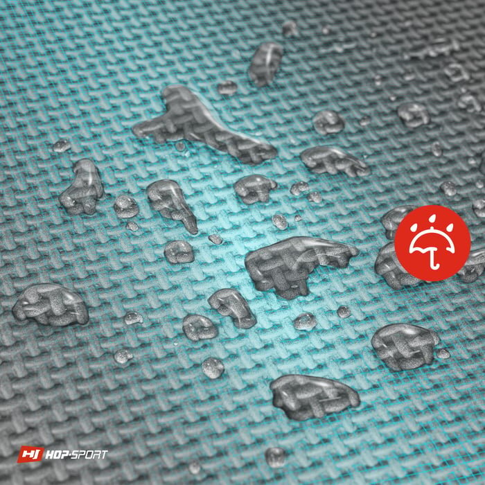 Szara mata puzzle z widocznymi kroplami wody na powierzchni. W prawym dolnym rogu znajduje się logo \'HOP-SPORT\' oraz czerwony symbol parasola.