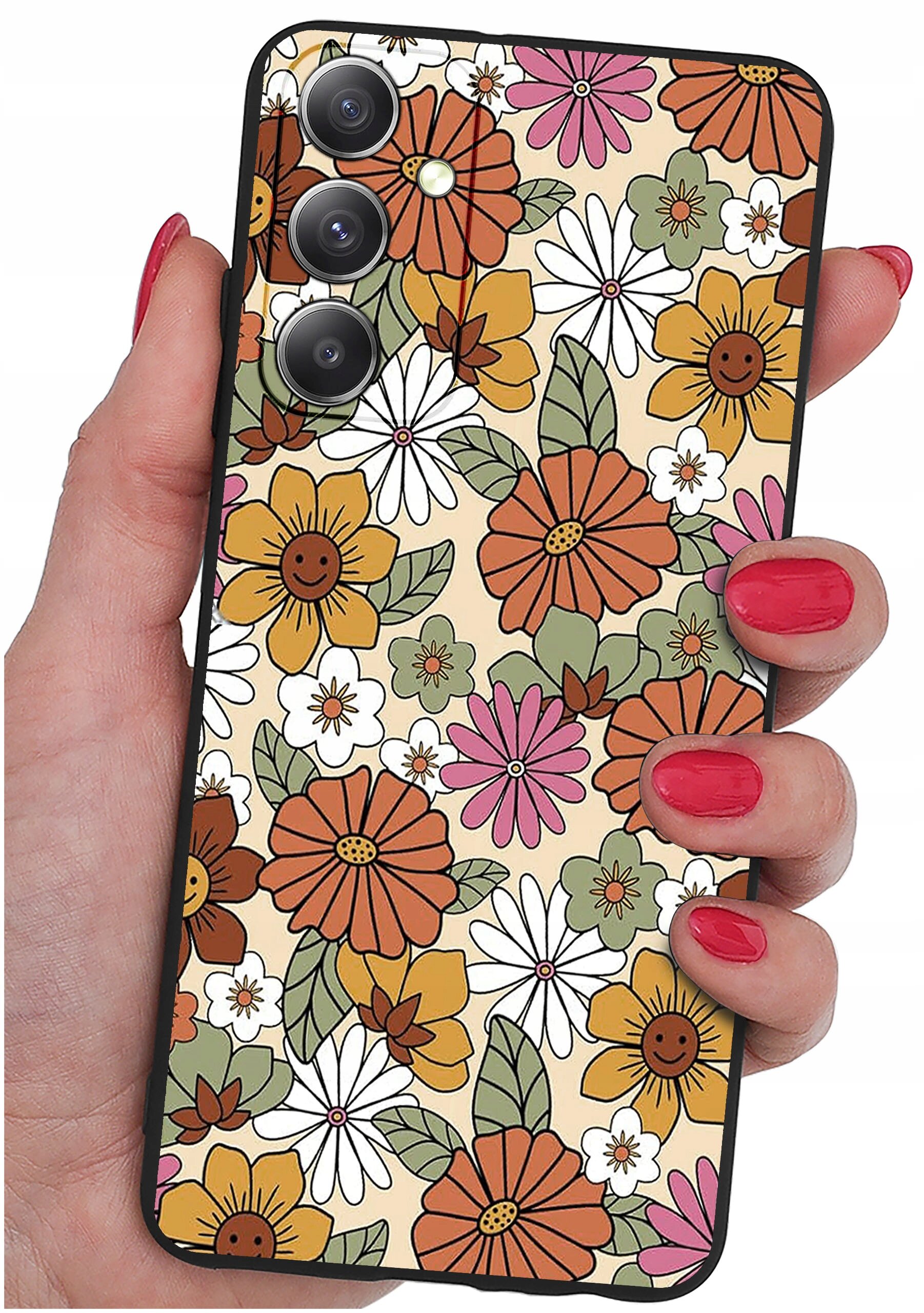 Etui na telefon z kolorowym wzorem kwiatów w odcieniach pomarańczowego, różowego, białego i zielonego. Trzymane jest w dłoni z pomalowanymi na czerwono paznokciami.