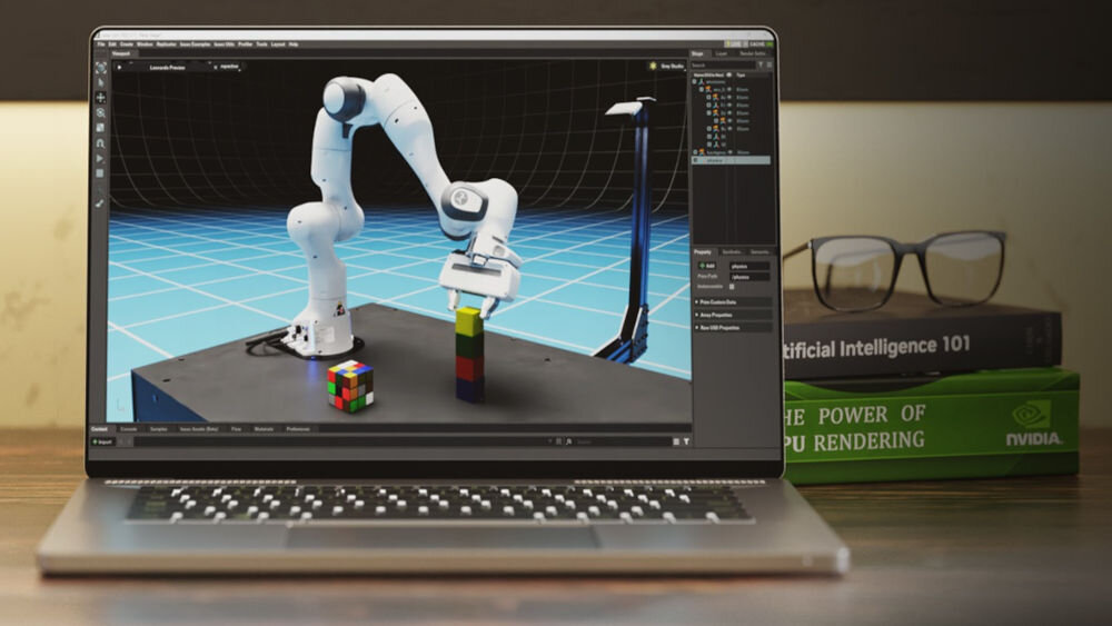 Na ekranie laptopa wyświetlany jest obraz przedstawiający ramię robota układające kolorowe klocki. Obok laptopa znajdują się okulary oraz książki z widocznymi napisami: \'Artificial Intelligence 101\' i \'THE POWER OF GPU RENDERING\'.