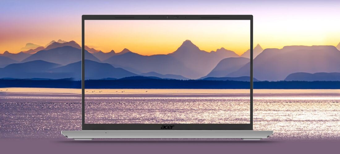Laptop Acer Aspire Go z matrycą Full HD wyświetla krajobraz górski o zachodzie słońca podczas pracy i oglądania multimediów 