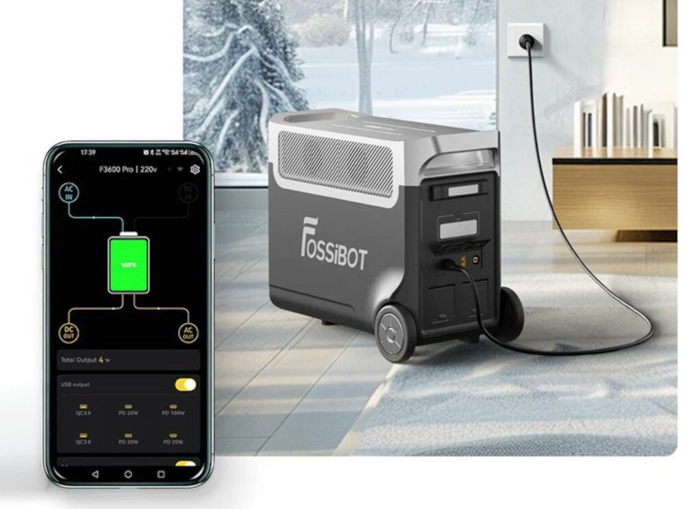 Stacja zasilania FOSSIBOT F3600 Pro 3600W Czarny stacja w pokoju podłączona do gniazdka na pierwszym tle telefon z włączoną aplikacją łączność Wi-Fi i Bluetooth obsługa aplikacji FOSSiBOT App można monitorować jej pracę i korzystać z funkcji sterowania