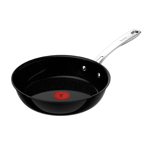 Czarna patelnia z czerwonym okrągłym wskaźnikiem na dnie i srebrnym uchwytem z napisem \'Tefal\'.