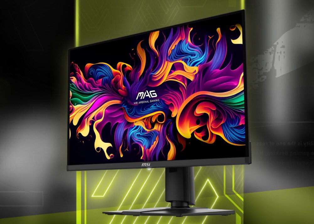 Monitor z wyświetlaczem prezentującym kolorową, abstrakcyjną grafikę. Na ekranie widoczny jest napis \'MAG MSI ARSENAL GAMING\'.