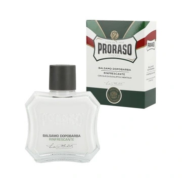 Na obrazie widoczny jest przezroczysty flakon z czarną zakrętką oraz pudełko z napisem \'PRORASO\' i \'BALSAMO DOPOBARBA RINFRESCANTE\'.