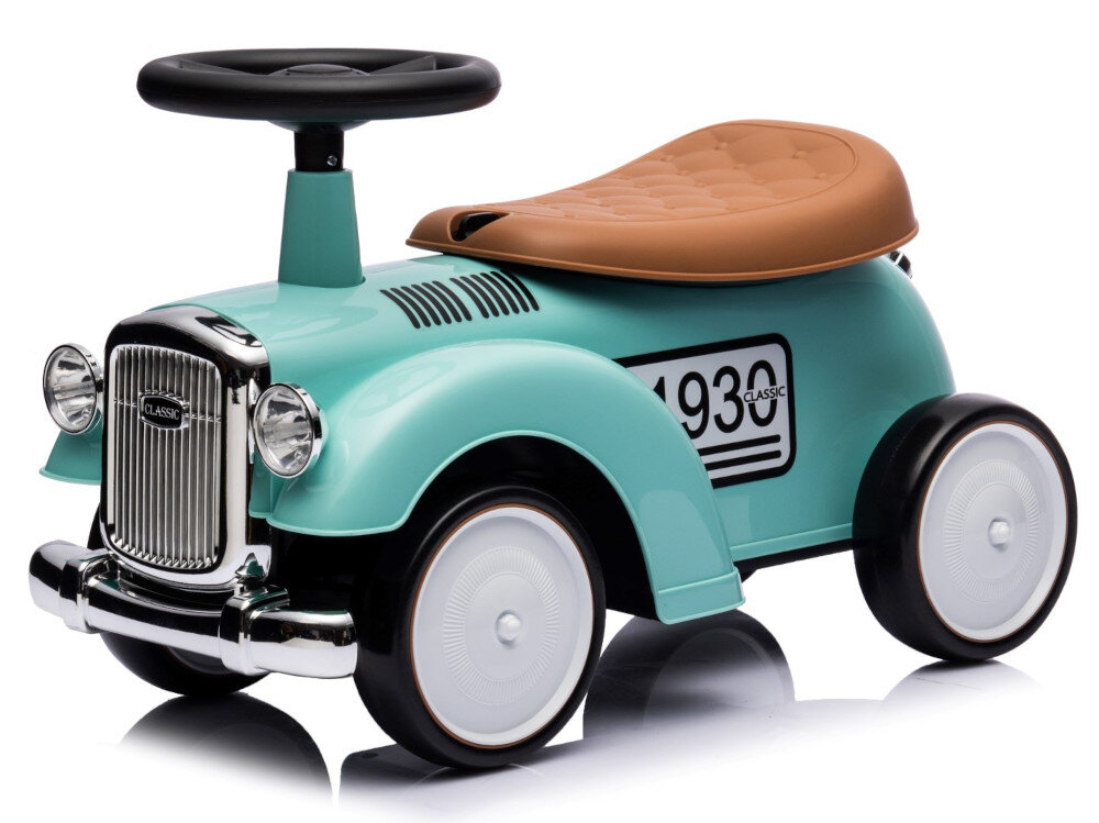 Jeździk w stylu retro w kolorze miętowym z brązowym siedzeniem, posiada cztery białe koła i czarną kierownicę. Na boku widoczny jest napis \'1930\' oraz \'CLASSIC\'.