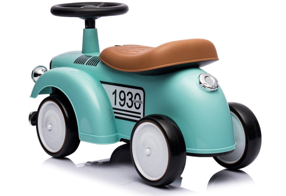 Jeździk w stylu retro w kolorze miętowym z brązowym siedzeniem i czarną kierownicą. Na boku widoczny jest napis \'1930 CLASSIC\'.