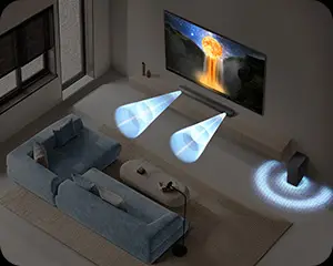300x240 2 b650f dolby audio dts virtualx Pokój z telewizorem na ścianie, przed którym stoi niebieska sofa i stolik. Na podłodze znajduje się subwoofer, a z telewizora i subwoofera emitowane są wizualizacje dźwięku.