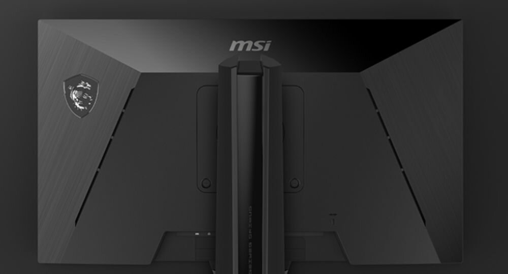 Tył monitora z widocznym logo MSI oraz centralnie umieszczonym uchwytem montażowym. Obudowa ma ciemny kolor z teksturą przypominającą szczotkowany metal.