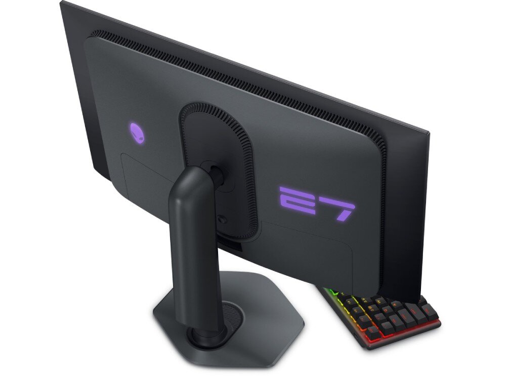 Monitor z ciemną obudową, na której widoczne jest podświetlane logo w kształcie głowy obcego oraz napis \'27\'.