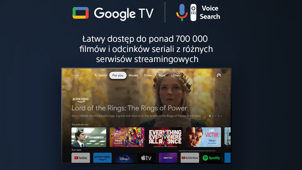 Obraz przedstawia interfejs Google TV z funkcją wyszukiwania głosowego. Widoczny jest tekst: \'Łatwy dostęp do ponad 700 000 filmów i odcinków seriali z różnych serwisów streamingowych\'.