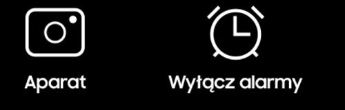 Na czarnym tle znajdują się dwa białe ikony: aparat fotograficzny z podpisem \'Aparat\' oraz zegar z podpisem \'Wyłącz alarmy\'.