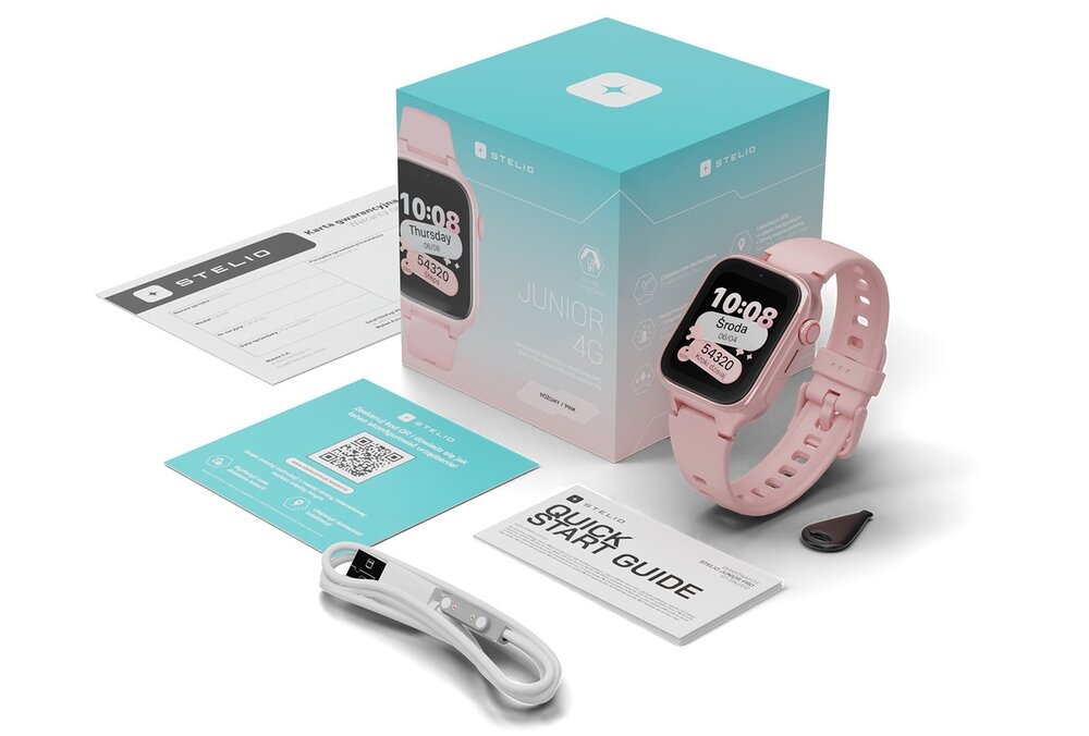 Na obrazie znajduje się różowy smartwatch z wyświetlaczem pokazującym godzinę 10:08 i dzień \'Środa\'. Obok zegarka widoczne są pudełko z napisem \'JUNIOR 4G\', przewód do ładowania, instrukcja \'QUICK START GUIDE\' oraz karta z kodem QR.