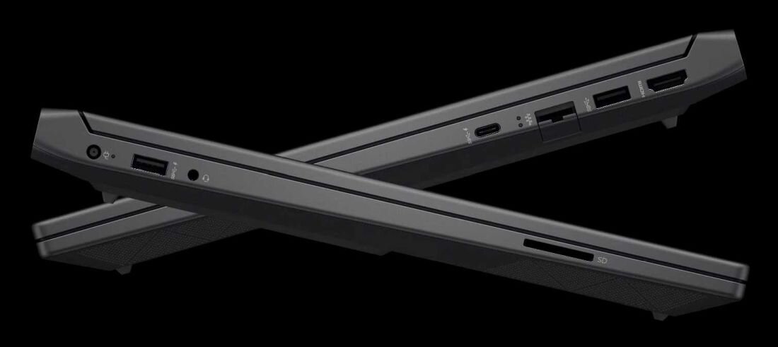 Dwa laptopy ustawione w kształt litery X, pokazujące boczne porty, w tym USB, HDMI i gniazdo słuchawkowe. Obudowy są w ciemnym kolorze na czarnym tle.