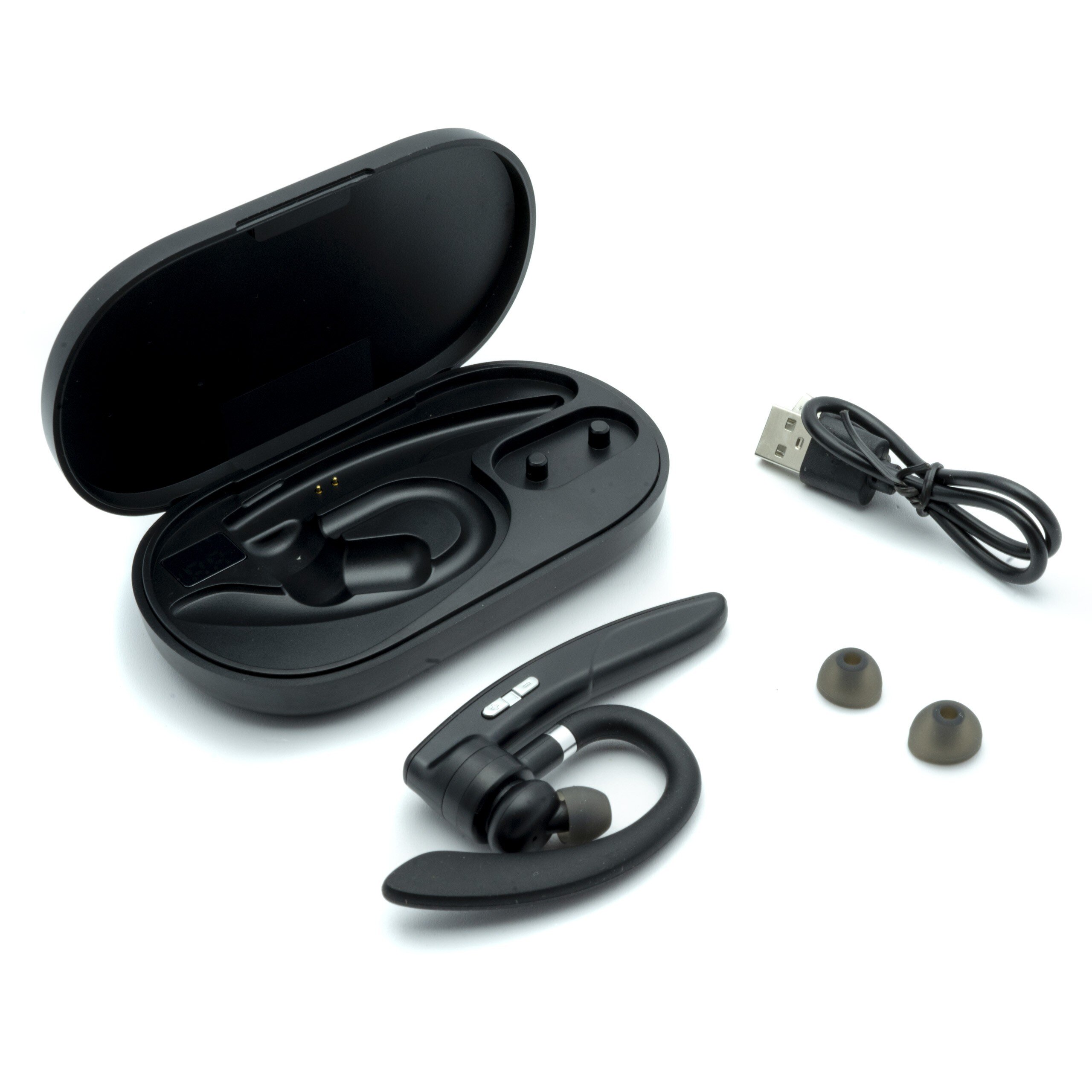 Na obrazie znajduje się czarna bezprzewodowa słuchawka douszna z wyświetlaczem, etui ładujące, kabel USB oraz dwie dodatkowe gumki do uszu. Etui jest otwarte, a słuchawka leży obok niego.