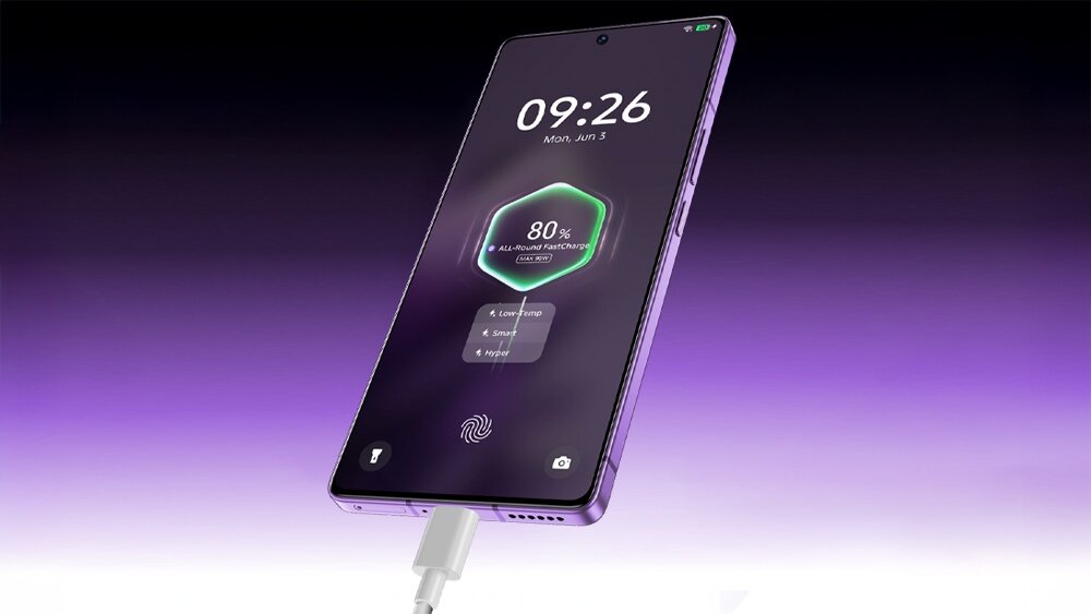 Smartfon z wyświetlaczem pokazującym godzinę 09:26, datę Mon, Jun 5 oraz poziom naładowania baterii 80%. Urządzenie jest podłączone do ładowarki, a tło ekranu jest fioletowe.