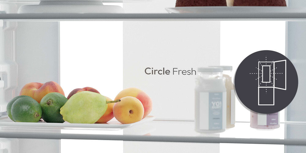 Wnętrze lodówki z owocami na półce oraz napisem \'Circle Fresh\'. Obok znajduje się okrągła ikona z symbolem drzwi lodówki.