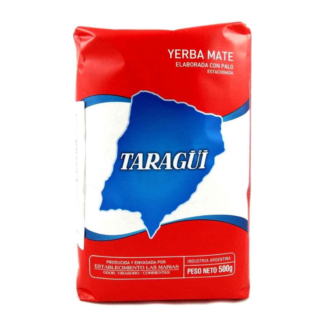 Opakowanie Yerba Mate Taragui Elaborada Tradicional Con Palo 500g w kolorze czerwonym z niebieskim logo w kształcie mapy. Na opakowaniu widoczny jest tekst: \'YERBA MATE ELABORADA CON PALO ESTACIONADA\', \'TARAGÜI\', \'PRODUCIDA Y ENVASADA POR ESTABLECIMIENTO LAS MARIAS\', \'INDUSTRIA ARGENTINA\', \'PESO NETO 500g\'.