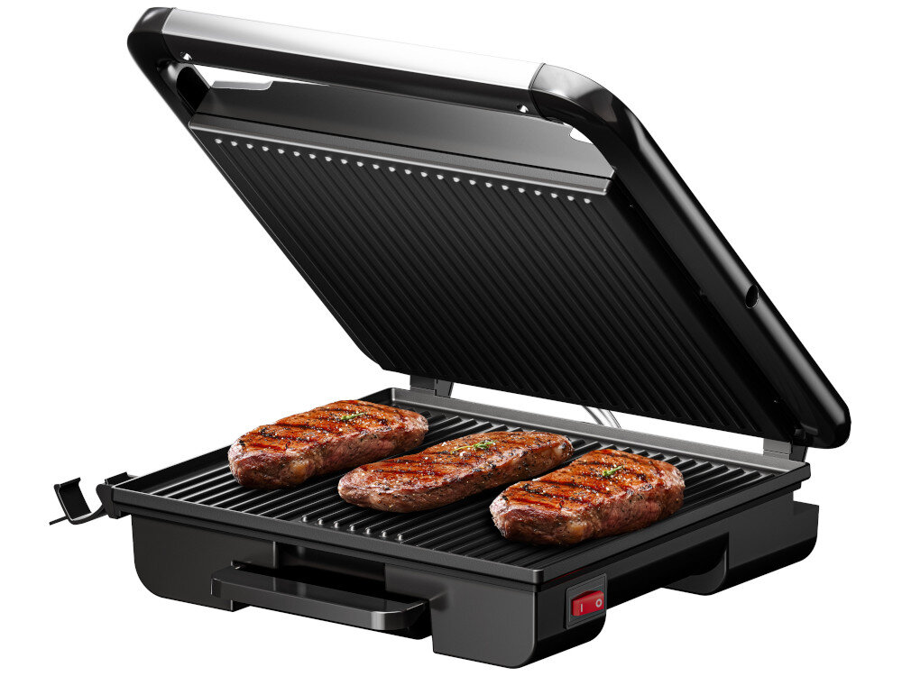 Grill elektryczny z otwartą pokrywą, na którym znajdują się trzy kawałki mięsa. Urządzenie ma czarną obudowę i widoczny czerwony przycisk zasilania.