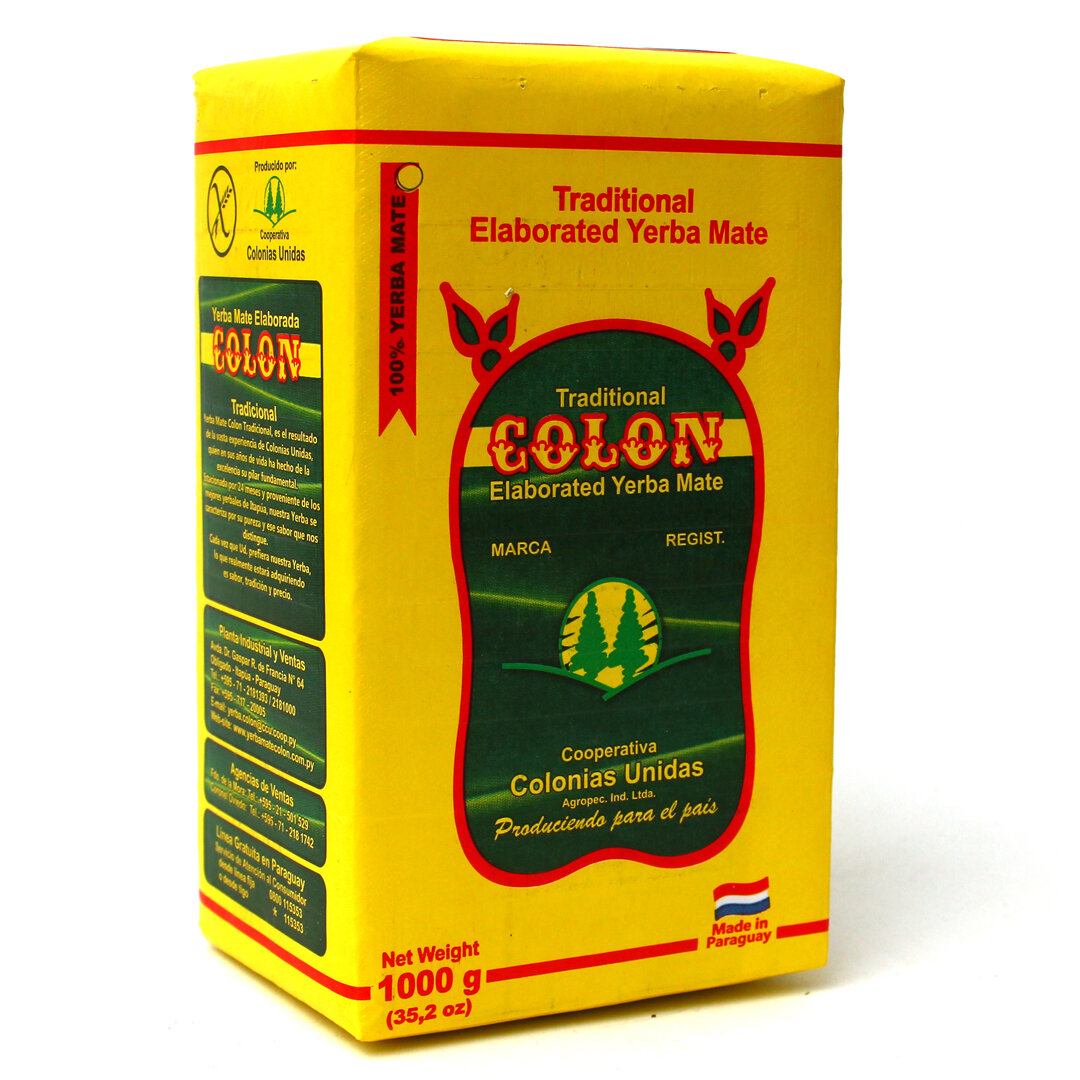 Opakowanie Yerba Mate Colon Tradicional 1kg w kolorze żółtym z zielonymi i czerwonymi elementami graficznymi. Widoczny tekst: \'Traditional Elaborated Yerba Mate\', \'Colon\', \'Net Weight 1000 g (35,2 oz)\', \'Made in Paraguay\'.