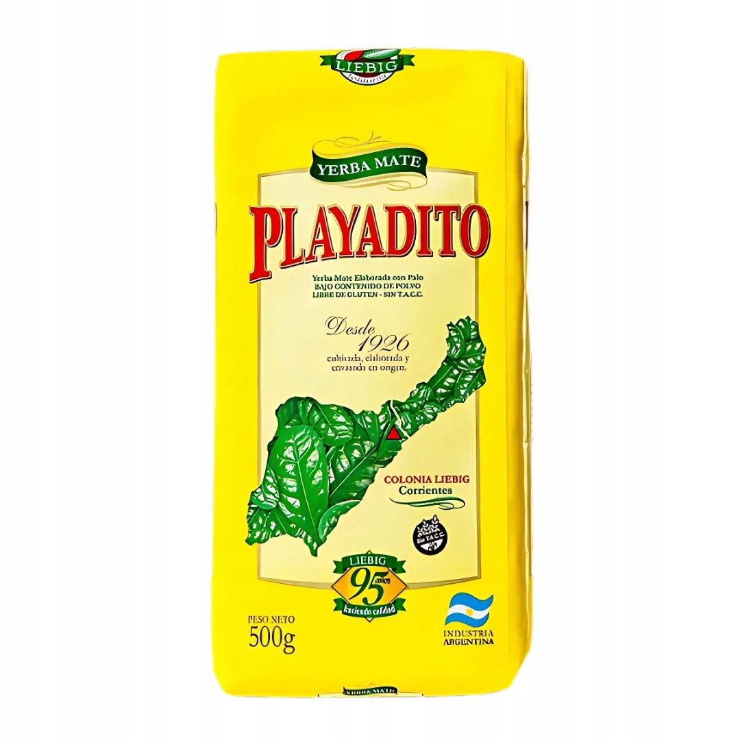 Opakowanie Yerba Mate Playadito Elaborada Con Palo Tradicional 500g w żółtym kolorze z dużym czerwonym napisem \'PLAYADITO\'. Widoczne są również napisy \'Desde 1926\', \'Peso Neto 500g\' oraz logo \'LIEBIG\'.