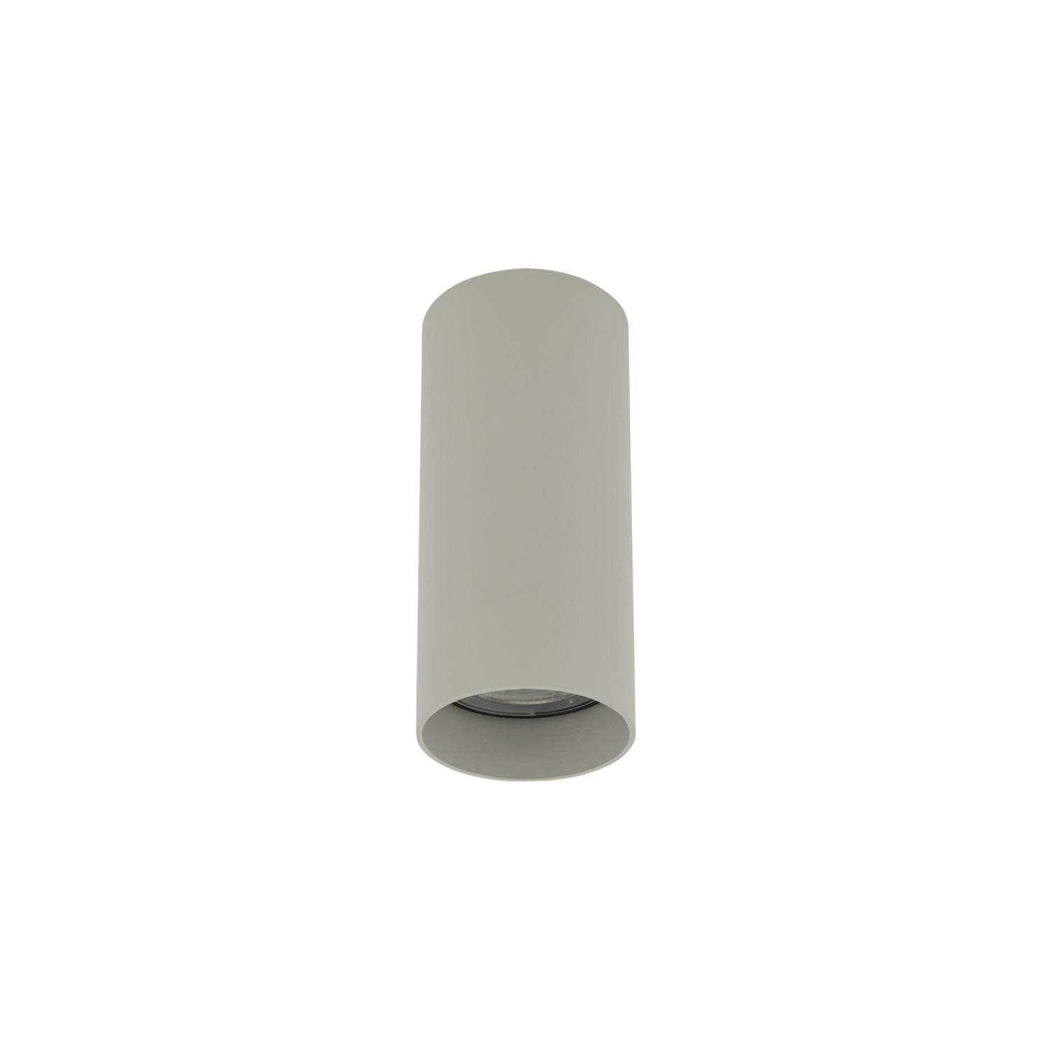 Obraz przedstawia cylindryczną lampę natynkową w jasnym kolorze. Lampa ma prosty, nowoczesny design.