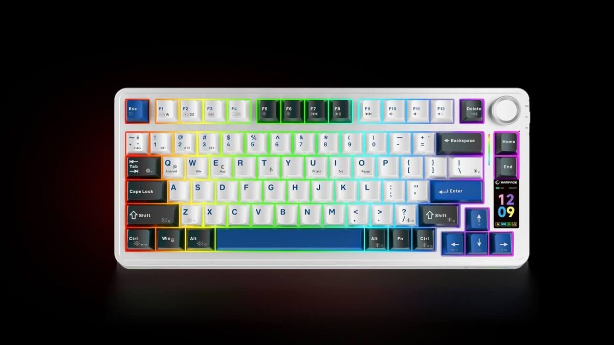 Klawiatura mechaniczna z podświetleniem RGB, posiadająca klawisze w różnych kolorach oraz pokrętło w prawym górnym rogu. Na klawiaturze widoczny jest wyświetlacz z godziną 12:09 i datą 12.